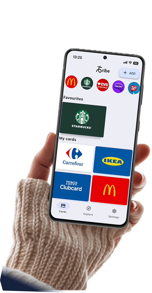 Tribe Rewards app showing loyalty cards on phone
